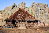 Hut and local Oromo family at Rafu. Bale Mountains National Park, Ethiopia, December 2011.