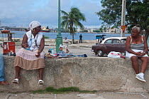 Women selling Santeria totems in Regla, Havana, Cuba, October, 2011.