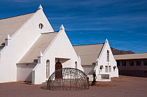 Church with Nama house structure in front of it, Kuboes, Richtersveld, Northern Cape, South Africa, August 2011.