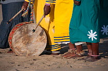 Drum on ground being played by a traditional healer during an early morning baptism, Durban beach, KwaZulu Natal, South Africa, August 2009.