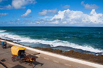 Horse drawn taxi and pedi-taxi along the seafront, Baracoa, Guantanamo Province, Eastern Cuba, November 2011.