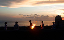 Canon lighting ceremony at sunset, Fort, Santiago de Cuba, Cuba, November 2011.