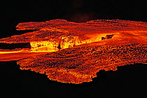 Rivers of molten lava showing surface cooling, inside caldera of Sierra Negra Volcano, Galapagos Islands.