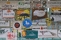 Signs advertising tours and safaris, Travel Agency, Kenya, October 2013.