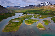 Aerial view of mountainous valley with small islands in the Vietasatno River, Stora Sjofallet National Park, Greater Laponia Rewilding Area, Lapland, Norrbotten, Sweden, June 2013.