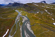 Aerial view of the Vietasatno River in mountainous valley near its source, Stora Sjofallet National Park, Greater Laponia Rewilding Area, Lapland, Norrbotten, Sweden, June 2013.