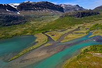 Aerial view of the Vietasatno river near its source with distant mountains, Stora Sjofallet National Park, Greater Laponia Rewilding Area, Lapland, Norrbotten, Sweden, June 2013.