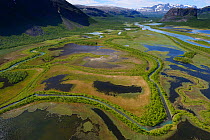 Aerial view of the Rapa river delta with distant mountains, Sarek National Park, Greater Laponia Rewilding Area, Lapland, Norrbotten, Sweden, June 2013.