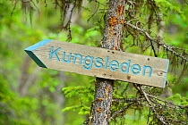 Sign post for the King's Trail hiking trail, Kvikkjokk, Greater Laponia Rewilding Area, Lapland, Norrbotten, Sweden, June 2013.