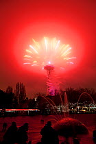 Space Needle with red sky during New Years firework display, Seattle, Washington, USA, 1st of January 2014.