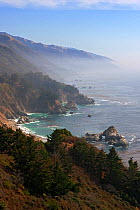 Cliffs with light mist over the Pacific Ocean, Big Sur, California, USA, October 2005.