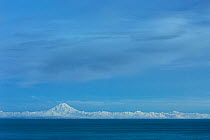 Volcano Mount Redoubt at dawn, Lake Clark National Park, Cook Inlet, Alaska, USA, March 2013.