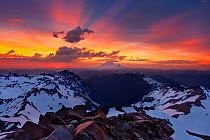 Mount Rainier at sunset, seen from the summit of Old Snowy Mountain in the Goat Rocks Wilderness of the Cascades in Washington, USA. July 2012.