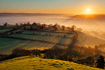 View across the Somerset Levels at dawn, seen from Glastonbury Tor, Somerset, England, UK, March 2012.