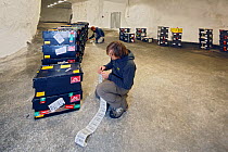 Man cataloguing newly arrived seed samples, Svalbard Global Seed Vault, Svalbard, Norway, October 2012.