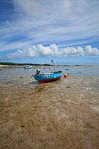 Small motor boat on the beach at St Martin's, The Isles of Scilly