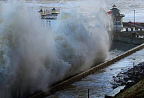 Wall of water crashing into Cromer seafront during storm surge., Norfolk, England, UK. December 2013.