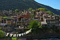 Barkam town, with prayer flags. Capital of Ngawa Tibetan and Qiang autonomous prefecture, Qinghai-Tibet Plateau, Sichuan Province, China, Asia