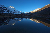 Makalu Mountain reflected in lake, Mount Qomolangma National Park, Dingjie County, Qinghai-Tibet Plateau, Tibet, China, Asia May 2013.