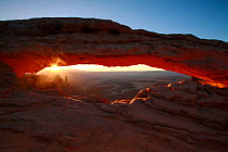 Sunrise at Mesa Arch, Island in the Sky section, Canyonlands National Park, Utah, Colorado Plateau, April 2010.