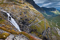 View of Trollstigen / National Tourist Road 63, with waterfall in Rauma municipality, More og Romsdal, Norway. September 2012