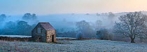 Stone barn at dawn, Bonsall, Peak District National Park, Derbyshire, UK. March 2013. Digitally stitched panorama.