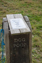 Note about Great tit (Parus major) nest in 'Dog Poo' container, Samphire Hoe nature reserve, Kent, England, April.