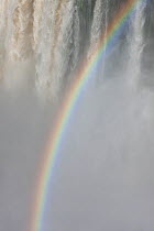 Iguazu falls with rainbow, Iguazu National Park, Brazil, January 2014.