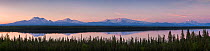 Panoramic landscape of WrangellSt. Elias National Park at sunset, few from Willow Lake with reflection of mountain range (from left); Mount Drum (3.661m), Mount Sanford (4.949m), Mount Wrangell (4.317...