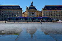 Building reflected in water, Bordeaux, France, September 2013.