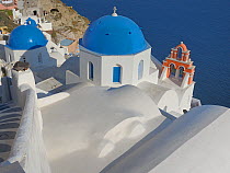 Orthodox churches, Oia, Santorini / Thira Island, Greece, May 2009.