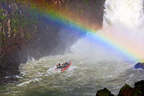 Boat and rainbow under the waterfalls of Salto San Martin. Iguazu falls, Brazil/Argentina, from the Argentine side. September 2010.
