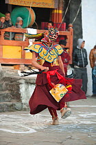 Phagcham (Pig dance / monastic dance). The monks perform this monastic dance, wearing the mask of a pig and draped in traditional dress, to neutralize the dance courtyard of the monastery. Torgya fest...