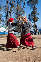 Monks rehearsing dance the day before the Torgya festival. Galdan Namge Lhatse Monastery, Tawang, Arunachal Pradesh, India. January 2014.