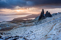 The Old Man of Storr in early morning light after a dusting of snow, Trotternish peninsula, Isle of Skye, Scotland, UK. December 2013.