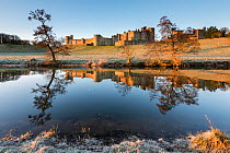 Alnwick Castle, frosty morning and reflections, Alnwick, Northumberland, UK. March 2014.