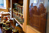 Local produce including jams and olives, for sale in the restaurant on Papkuilsfontein farm, Northern Cape, South Africa. August 2013.