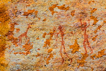 Figures of humans hunting with bows and arrows in rock art, Sevilla Bushman Rock Art Trail, Clanwilliam, Cederberg Mountains, Western Cape province, South Africa, September 2012.