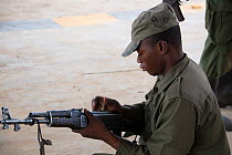 Park ranger with rifle Garamba National Park, Democratic Republic of the Congo, February 2012.