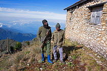 Park rangers standing on Point Margerita, Virunga National Park UNESCO World Heritage Park, Democratic Republic of the Congo, February 2012.