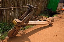 Wooden scooter called a 'tshukudu' for transporting goods, Goma, Democratic Republic of the Congo, May 2012. Completed