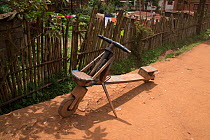 Wooden scooter called a 'tshukudu' for transporting goods, Goma, Democratic Republic of the Congo, May 2012.