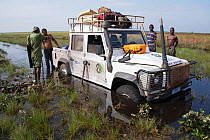 Jeep stuck in flooded road to Kundelungu National Park, Katanga, Democratic Republic of the Congo, April 2012.