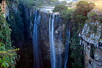 Waterfall over deep, narrow gorge. Magwa Falls, Pondoland, Eastern Cape, South Africa, June 2012.