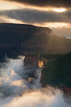Light illuminating mist in a deep canyon. Blyde River Canyon, Mpumalanga, South Africa. January 2011. Non-ex.