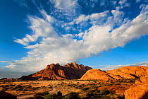 Spitzkoppe mountains below cloudy summer sky. Spitzkoppe, Erongo, Namibia. March 2012. Non-ex.