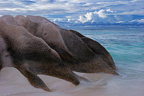 Beach and rocks on a stormy afternoon, La Digue island, Seychelles. October 2012. Non-ex.