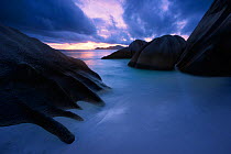 Twilight on the Anse Source d'Argent beach. La Digue Island, Seychelles. October 2012. Non-ex.