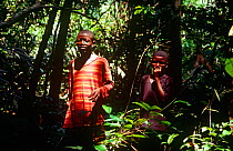 Batwa Pygmies, father and son foraging for food. Democratic Republic of the Congo, 2008-2009.
