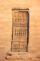 Ritual carving on Dogon door, Bandiagara, Mali, 2005-2006.
